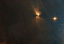 在一個擁有約3000億顆恒星的星系中 ESA哈勃太空望遠鏡只捕獲了極少數的一兩個
